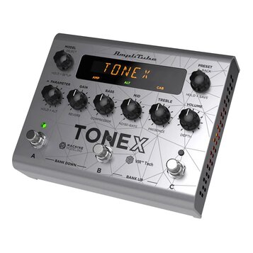 Stříbrný kytarový procesor s nápisem TONEX a logem AmpliTube. Zařízení má pět otočných ovladačů s popisy GAIN, BASS, MID, TREBLE a VOLUME, displej s…