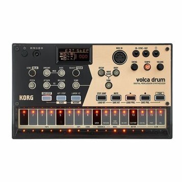 Digitální perkusní syntetizátor KORG volca drum v černo-béžovém provedení. Na přístroji jsou viditelné nápisy KORG, volca drum a DIGITAL PERCUSSION S…