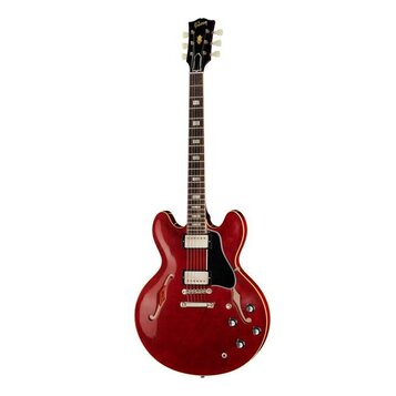 Polodupatá elektrická kytara v červené barvě s černým hmatníkem a černým plechtrádem. Na hlavě je viditelné logo Gibson. Nástroj má dva humbuckery, d…