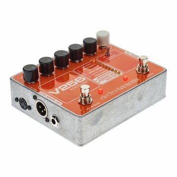 Oranžový vocoder s kovovým šedým šasi. Na horní straně je nápis V256 vocoder a logo electro-harmonix. Zařízení má několik černých a jeden bílý ovláda…